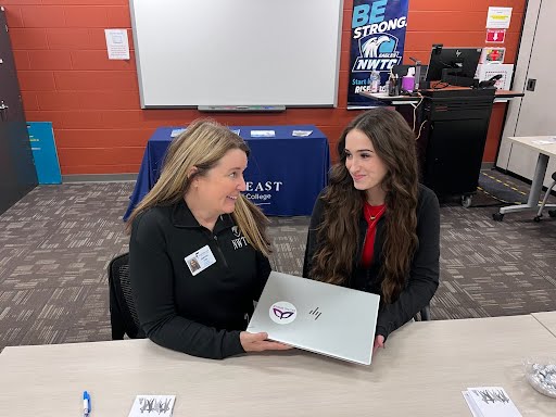NWTC Volunteer and a Device Recipient
